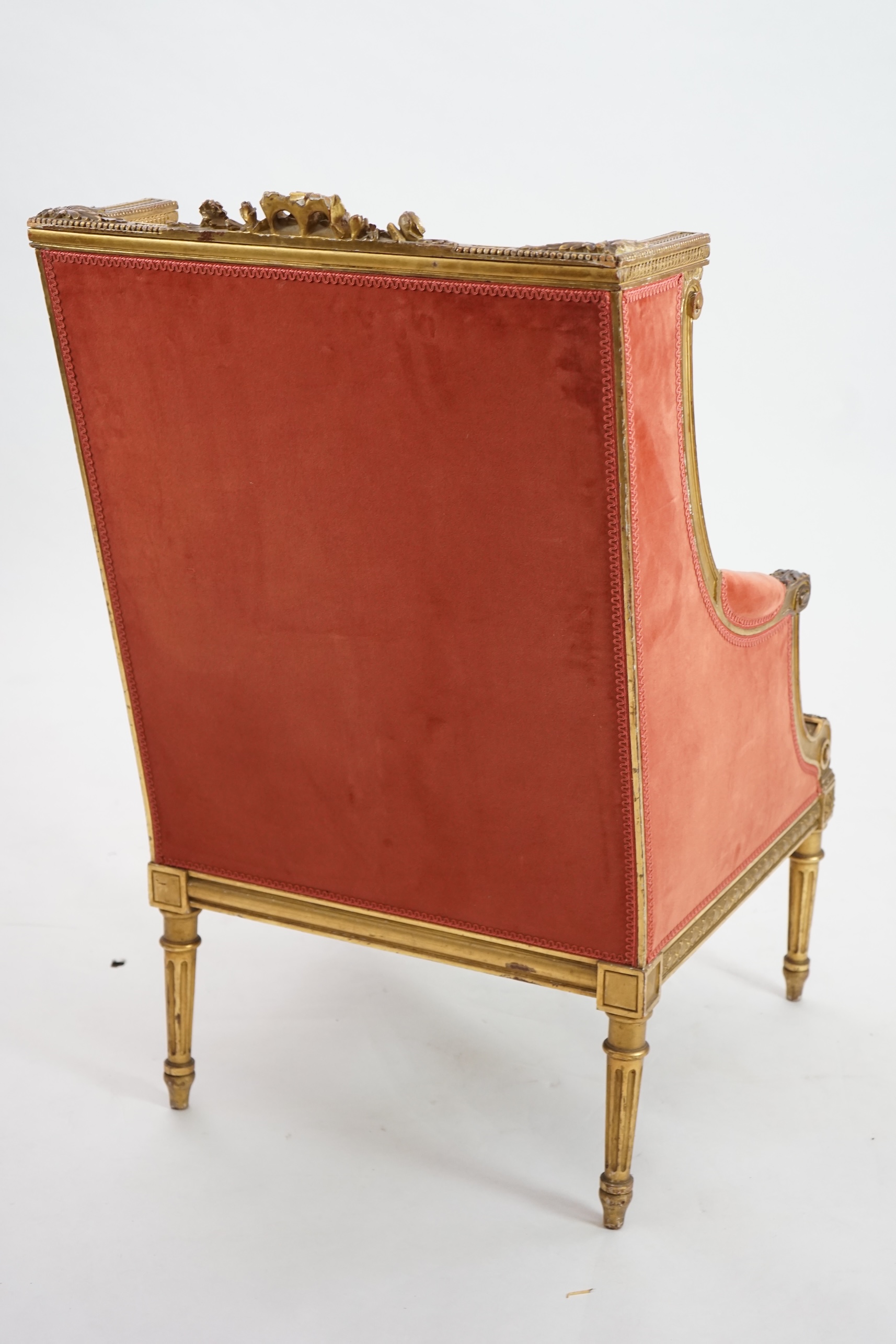 A Louis XVI style carved giltwood fauteuil, circa 1900